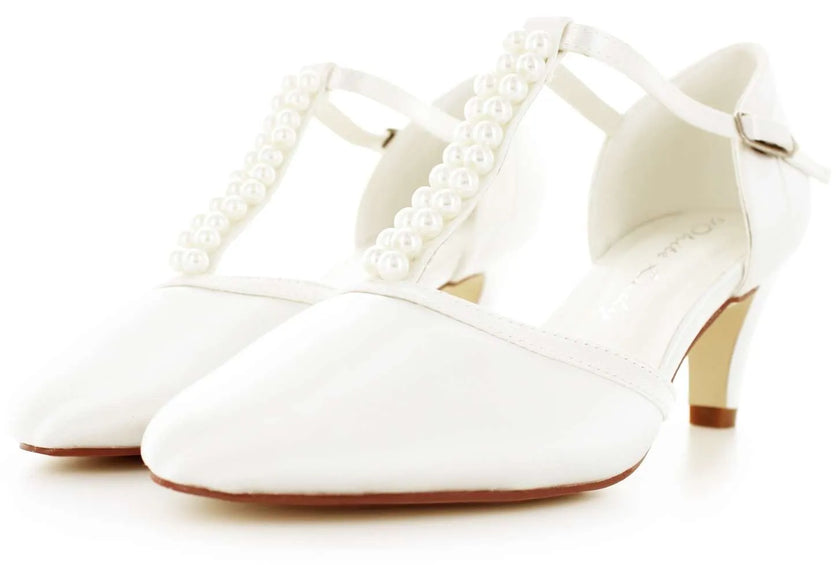 Zapatos de novia Rodonita en color ivory con detalles de perlas, tacón elegante y correa en T, perfectos para bodas y eventos especiales.